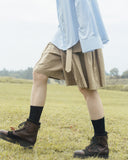 Side pleated half pants